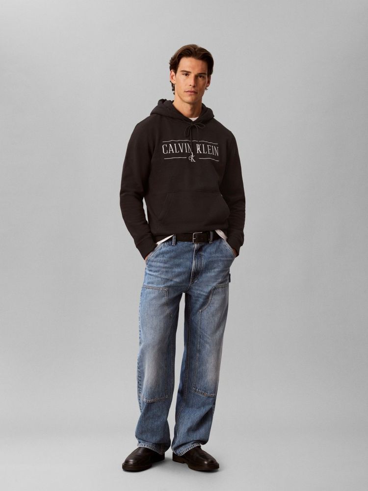 Calvin Klein Hoodie Zwart heren (LS 350FLEECE EU VARSITY SERIF HOODIE - LV04RH238G.UB1) - GL Sport (Sluis)