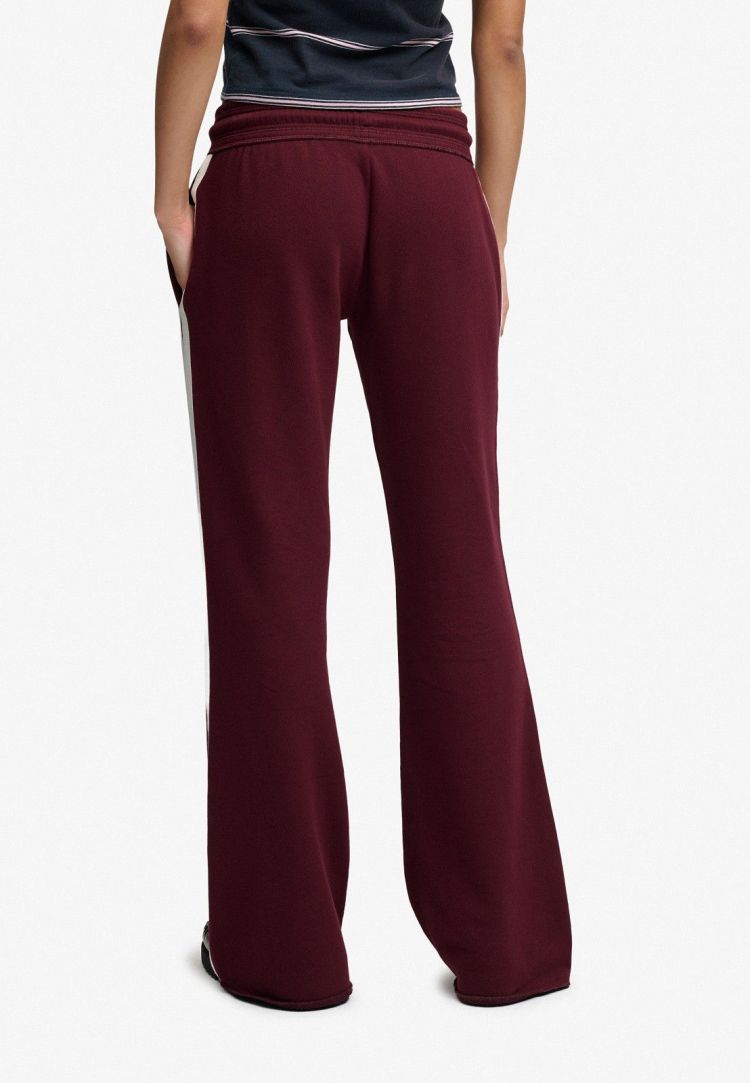 Superdry & Co Joggingbroek Bordeaux dames (ATHLETIC ESSENTIALS STRIPE FLARE JOGGING - W7011308A.1KD) - GL Sport (Sluis)